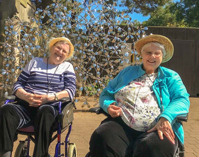 Ladies enjoying the art at the Botanics, Edinburgh