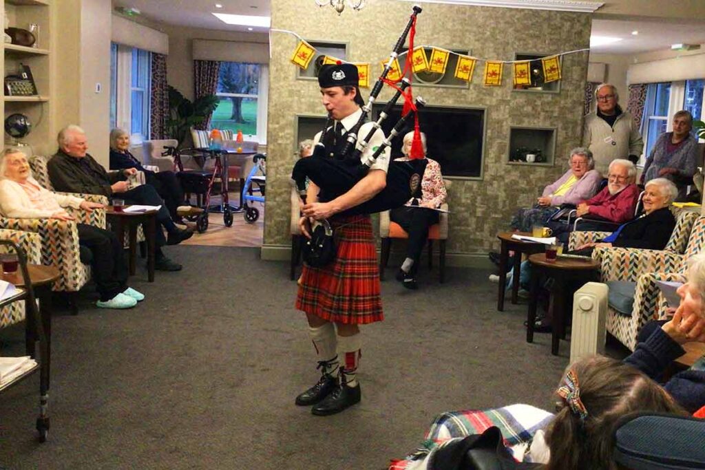 peebles care home Burns piping audience